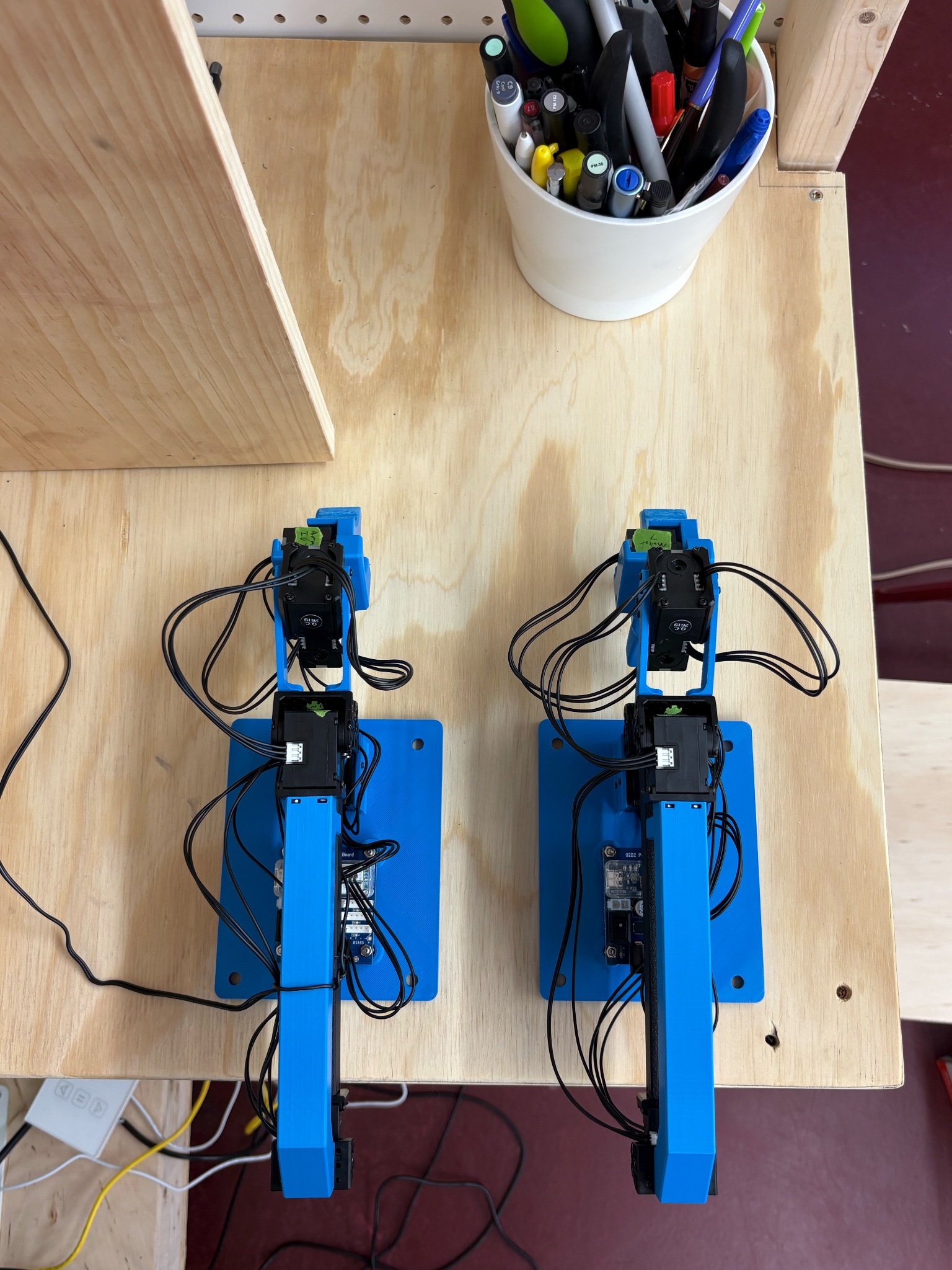 Birdseye view of both completed GELLO arms