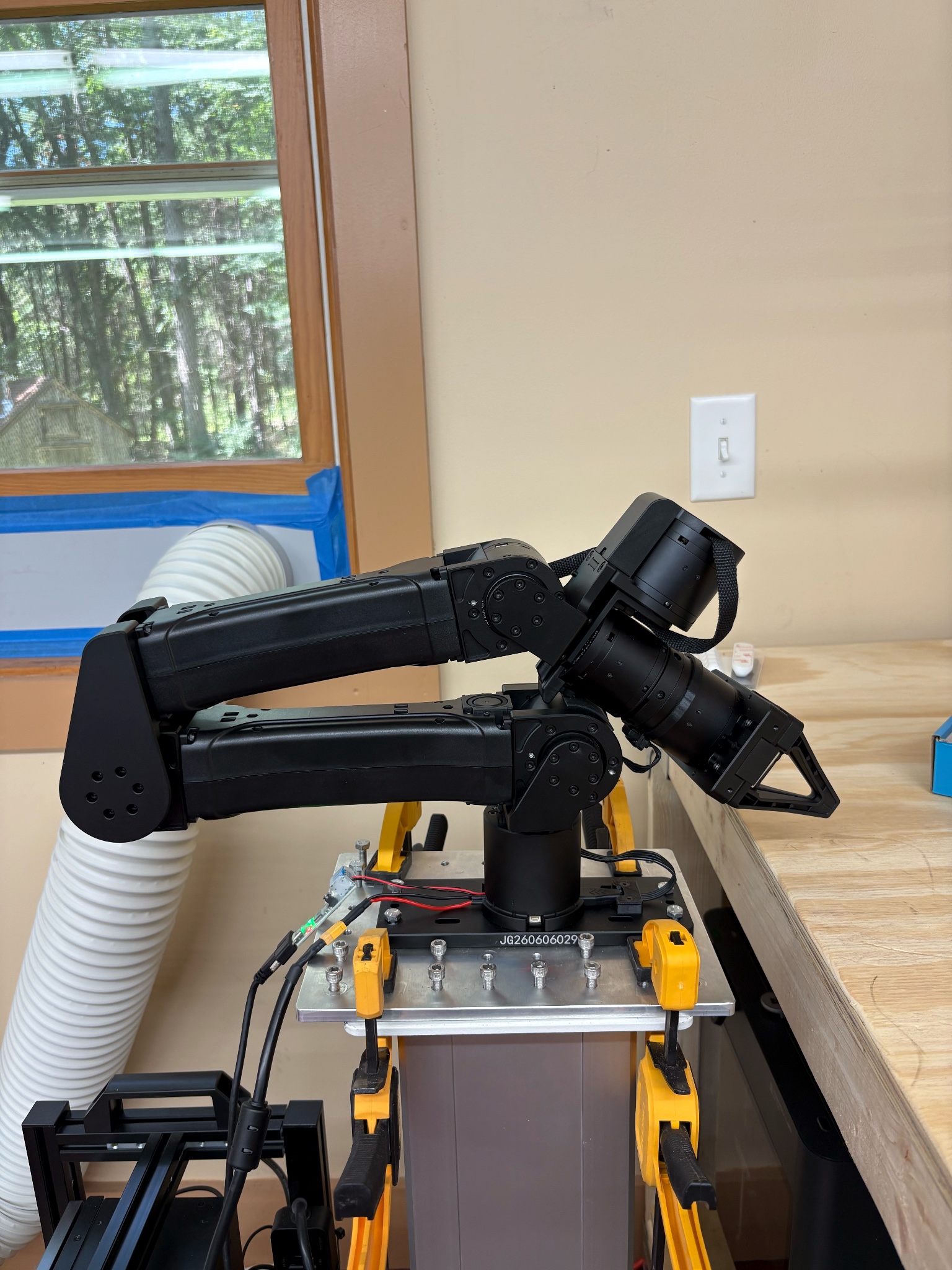 YAM follower arm secured at the workbench